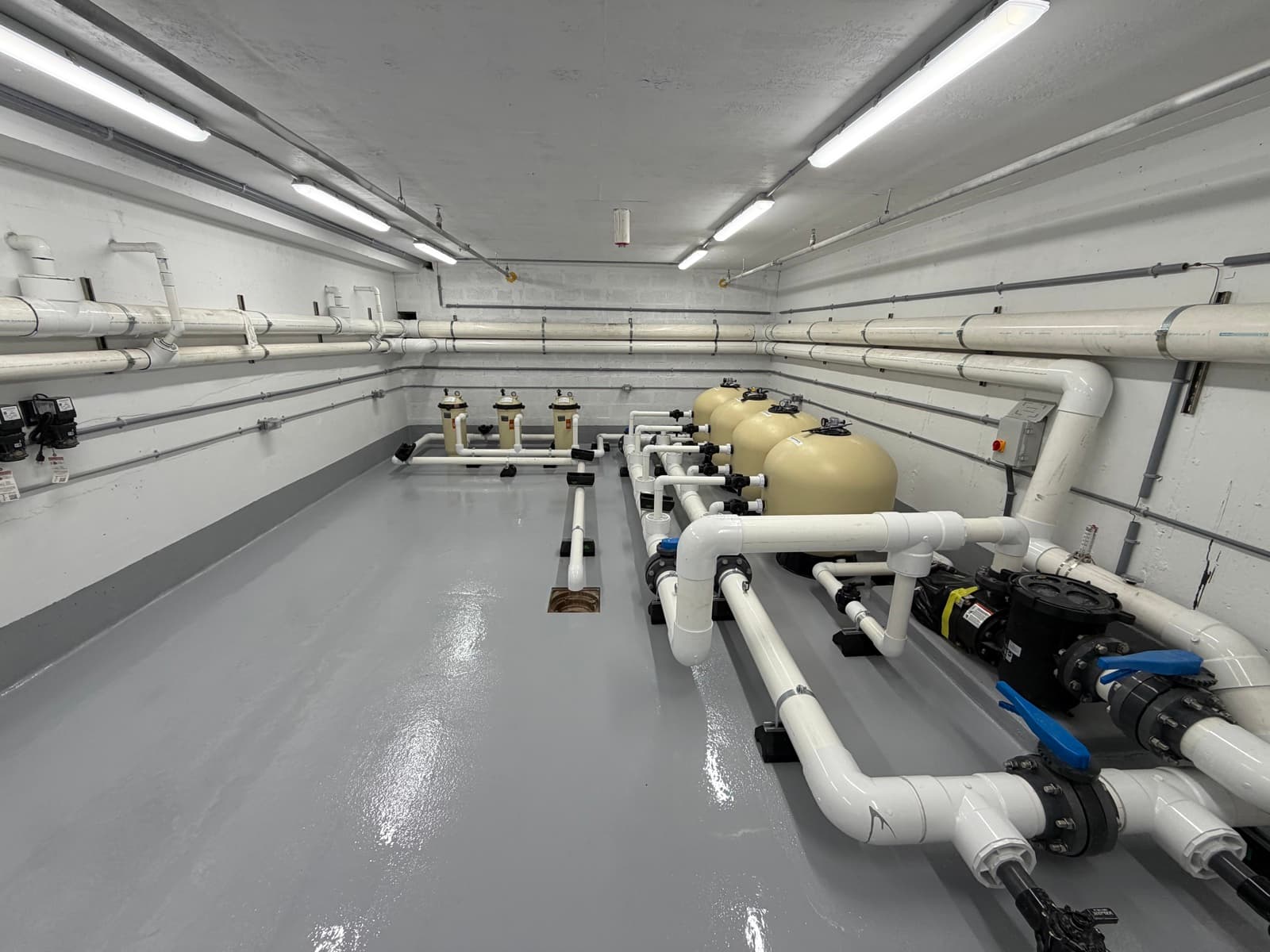 Pristine commercial pool equipment room, inspected by Deco Pools